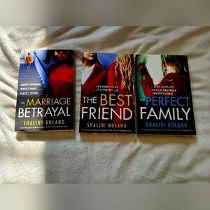 Source Unknown Book Set with Blue, Red, Yellow Covers